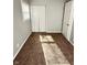 Well-lit bedroom, neutral walls and carpet, includes a closet at 9508 Conried Dr, Indianapolis, IN 46235