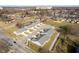 Aerial view of new construction townhomes with gray roofs and ample parking at 1623 Capra Ct, Beech Grove, IN 46107
