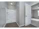 Bathroom with shower stall and gray walls at 1623 Capra Ct, Beech Grove, IN 46107