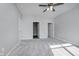 Bright bedroom with ceiling fan and access to closets at 1623 Capra Ct, Beech Grove, IN 46107
