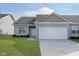 Gray siding ranch home with attached garage and landscaping at 1623 Capra Ct, Beech Grove, IN 46107