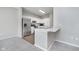 Modern kitchen with stainless steel appliances and white cabinets at 1623 Capra Ct, Beech Grove, IN 46107
