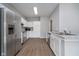 Modern kitchen featuring stainless steel appliances and white cabinets at 1623 Capra Ct, Beech Grove, IN 46107