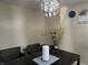 Dining area featuring a modern chandelier and table at 1810 Farm Meadow Dr, Greenwood, IN 46143