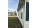 Well-maintained house exterior with vinyl siding and a neatly kept lawn at 1810 Farm Meadow Dr, Greenwood, IN 46143
