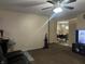 Bright living room with large windows and a view into the dining area at 1810 Farm Meadow Dr, Greenwood, IN 46143