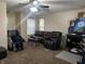 Relaxing living room featuring a sectional sofa and a massage chair at 1810 Farm Meadow Dr, Greenwood, IN 46143