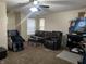 Relaxing living room featuring a sectional sofa and a massage chair at 1810 Farm Meadow Dr, Greenwood, IN 46143