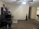 Spacious living room with a ceiling fan and plenty of natural light at 1810 Farm Meadow Dr, Greenwood, IN 46143