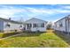 Cute bungalow style home with a spacious lawn and walkway at 1837 E Legrande Ave, Indianapolis, IN 46203
