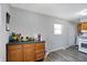 Bright kitchen with wood cabinets and vinyl flooring at 1837 E Legrande Ave, Indianapolis, IN 46203