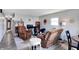 Living room with brown recliner chairs, a TV, and a small table at 1837 E Legrande Ave, Indianapolis, IN 46203