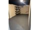 Finished basement with shelving and grey flooring at , Indianapolis, IN 46203