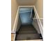 Stairs leading down to a finished basement at , Indianapolis, IN 46203