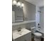 Clean bathroom with white vanity, neutral walls, and a tub shower at , Indianapolis, IN 46203
