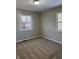 Bright bedroom with new carpet and neutral walls at , Indianapolis, IN 46203