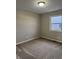 Spacious bedroom with neutral walls and carpet at , Indianapolis, IN 46203