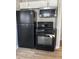 Modern black kitchen appliances including range, oven, and microwave at , Indianapolis, IN 46203