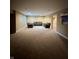 Spacious basement featuring plush carpet and recessed lighting, perfect for entertaining and relaxing at 2504 Fawn Bluff Ct, Zionsville, IN 46077