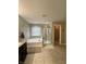 Bathroom features a soaking tub, a glass shower, a toilet, and a vanity with a granite countertop at 2504 Fawn Bluff Ct, Zionsville, IN 46077