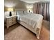 Bedroom featuring a bed with two nightstands and decorative curtains at 2504 Fawn Bluff Ct, Zionsville, IN 46077
