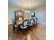 Elegant dining room featuring a large wooden table, upholstered chairs, and a decorative china cabinet at 2504 Fawn Bluff Ct, Zionsville, IN 46077