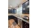 Well-equipped kitchen features granite counters and stainless steel appliances at 2504 Fawn Bluff Ct, Zionsville, IN 46077