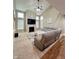 Bright living room with vaulted ceiling, fireplace, and comfortable seating at 2504 Fawn Bluff Ct, Zionsville, IN 46077