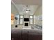 Inviting living room featuring a cozy fireplace and lots of natural lighting at 2504 Fawn Bluff Ct, Zionsville, IN 46077