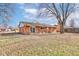 Brick house backyard view with mature tree at 2832 S Oakland Ave, Indianapolis, IN 46203