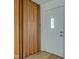 Entryway with bi-fold doors and white door at 2832 S Oakland Ave, Indianapolis, IN 46203