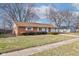 Brick ranch house with attached garage and landscaped yard at 2832 S Oakland Ave, Indianapolis, IN 46203