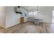 Kitchen with light cabinets and laminate flooring at 2832 S Oakland Ave, Indianapolis, IN 46203