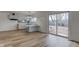 Eat-in kitchen with white cabinets and vinyl flooring at 2832 S Oakland Ave, Indianapolis, IN 46203