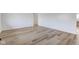 Spacious living room featuring light wood laminate flooring at 2832 S Oakland Ave, Indianapolis, IN 46203