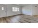 Living room with light wood laminate flooring at 2832 S Oakland Ave, Indianapolis, IN 46203
