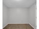 Empty bedroom with brown carpet and neutral walls at 2875 Adams St, Indianapolis, IN 46218