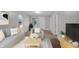 Bright living room features neutral walls, light-colored furniture, and plush carpeting at 2875 Adams St, Indianapolis, IN 46218