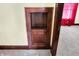 Bedroom showing built-in shelf storage and a peek into another room at 403 Colescott St, Shelbyville, IN 46176