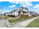 Charming two-story home with inviting front porch and well-manicured lawn at 403 Colescott St, Shelbyville, IN 46176