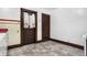 View of kitchen showing tile walls, light floors and vintage kitchen cabinets at 403 Colescott St, Shelbyville, IN 46176
