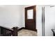 Vintage kitchen near stairs with white refrigerator and pantry space at 403 Colescott St, Shelbyville, IN 46176