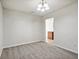 Simple dining area with grey carpet and an open view to the kitchen at 573 New Moon St, Avon, IN 46123