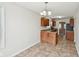 Bright dining area with tile floors and a chandelier at 573 New Moon St, Avon, IN 46123