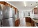 Kitchen boasts stainless steel appliances and granite counters at 573 New Moon St, Avon, IN 46123