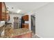 Modern kitchen with granite countertops and stainless steel appliances at 573 New Moon St, Avon, IN 46123