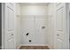 Laundry closet with shelving and hookups at 573 New Moon St, Avon, IN 46123