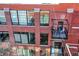 Private balcony overlooking the courtyard at 630 N College Ave # 401, Indianapolis, IN 46204