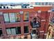 Private balcony with metal railings and brick building exterior at 630 N College Ave # 401, Indianapolis, IN 46204