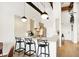 Modern kitchen with white cabinets and marble countertops at 630 N College Ave # 401, Indianapolis, IN 46204